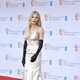 Sienna Miller en la alfombra roja de los BAFTA 2022