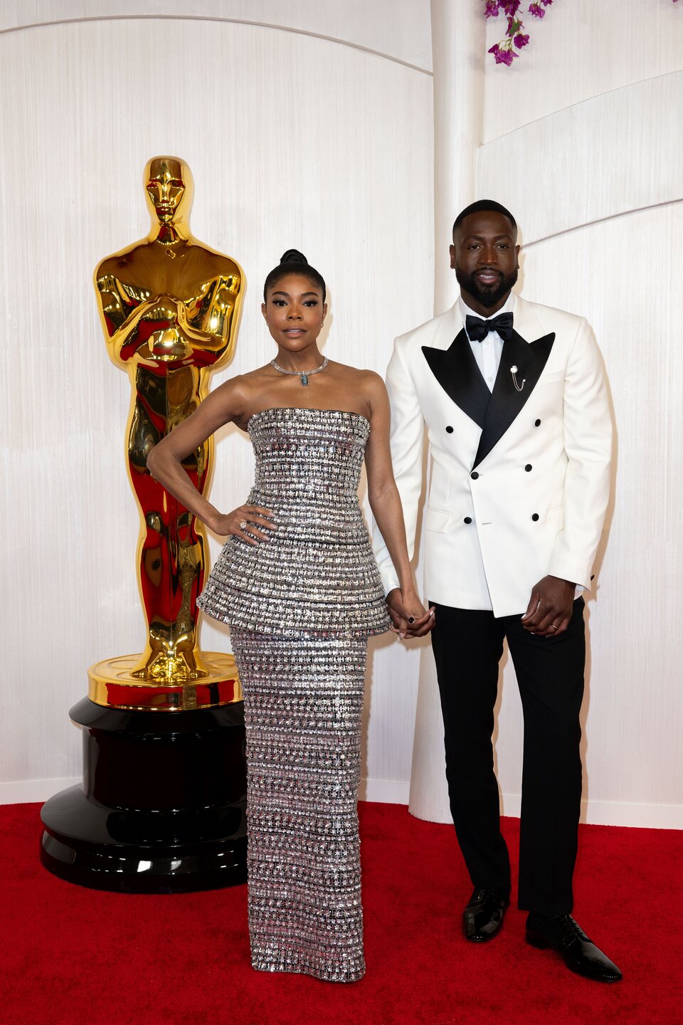 Gabrielle Union y Dwayne Wade en la alfombra roja de los Oscar 2024