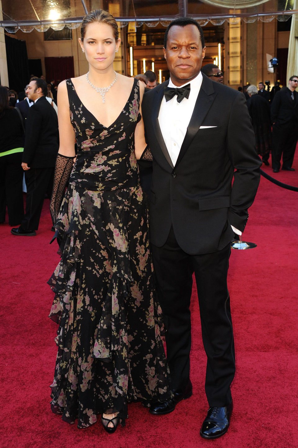 Geoffrey Fletcher y Cody Horn en la alfombra roja de los Oscar 2011