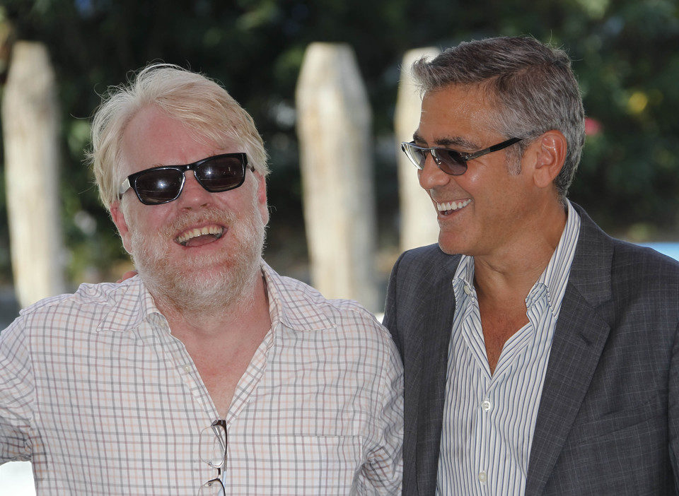 Philip Seymour Hoffman y George Clooney en el Festival de Venecia