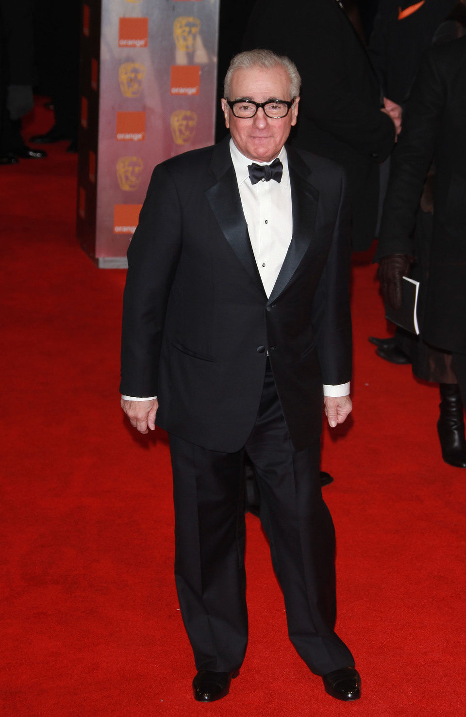 Martin Scorsese posa a la entrada de los premios BAFTA 2012