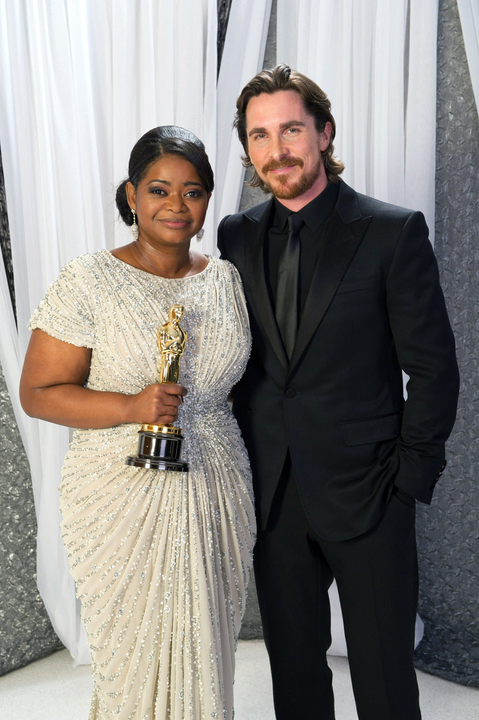 Octavia Spencer, Oscar a la mejor actriz de reparto, y Christian Bale