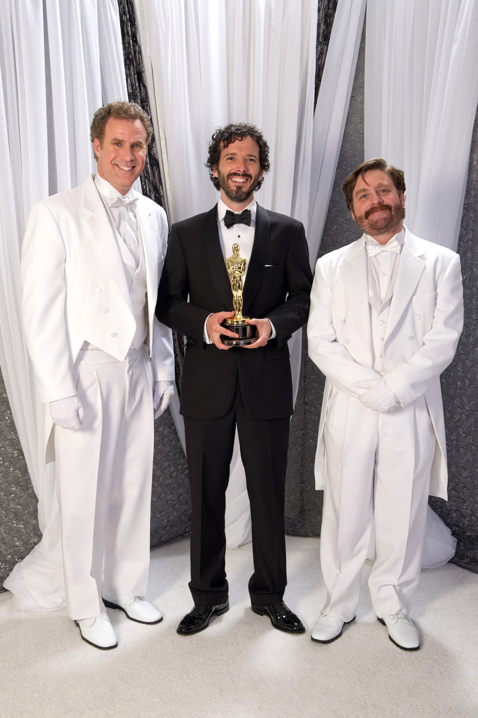 Bret McKenzie, ganador del Oscar a la mejor canción, con Will Ferrell y Zach Galifianakis