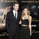 Liam Hemsworth y Miley Cyrus en la premiére mundial de 'Los Juegos del Hambre'