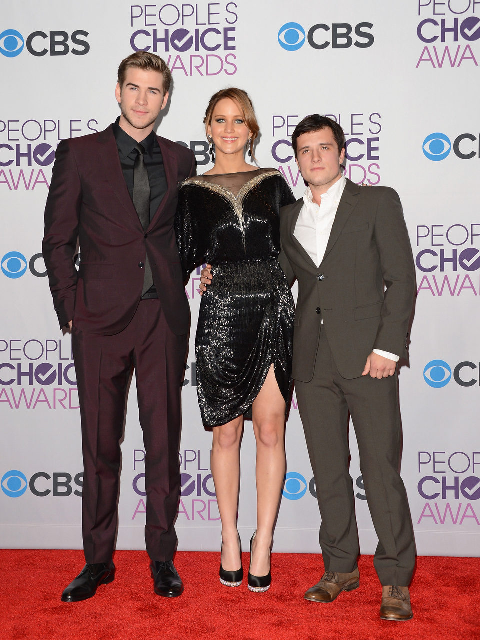 Liam Hemsworth, Jennifer Lawrence y Josh Hutcherson en la gala de los People's Choice Awards 2013