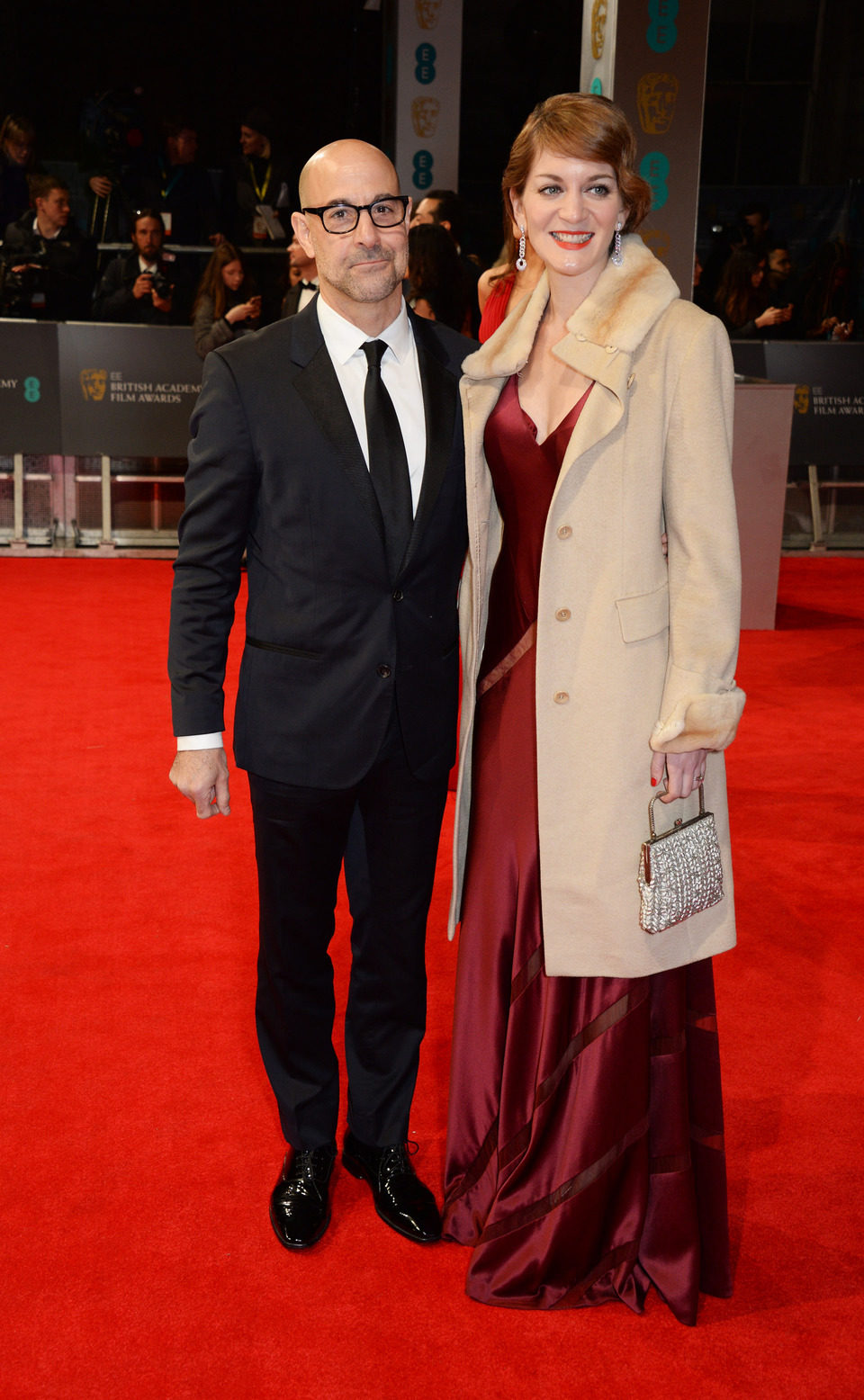 Stanley Tucci y Felicity Blunt en la alfombra roja de los BAFTA 2014