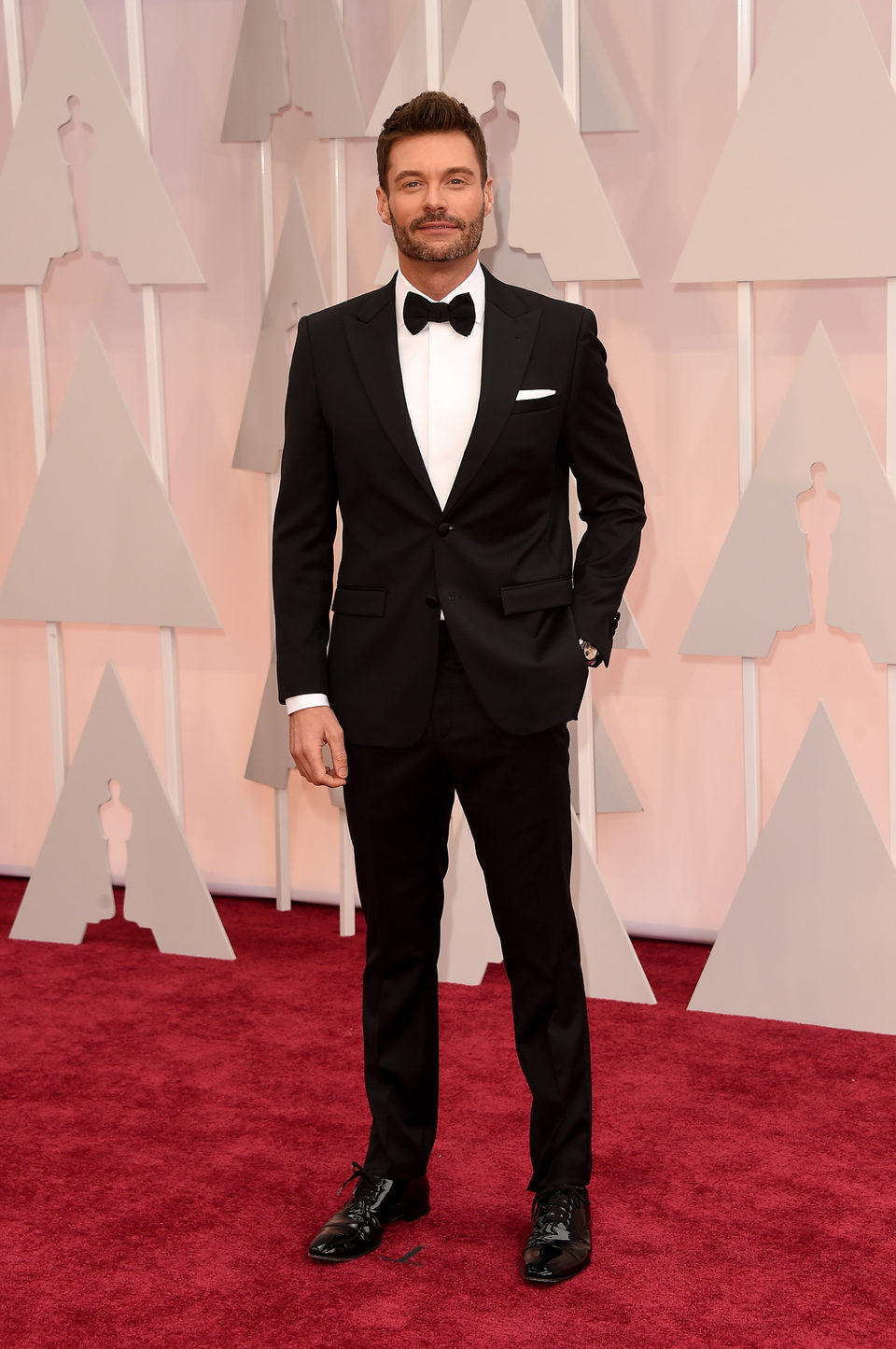 Ryan Seacrest en la alfombra roja de los Oscar 2015