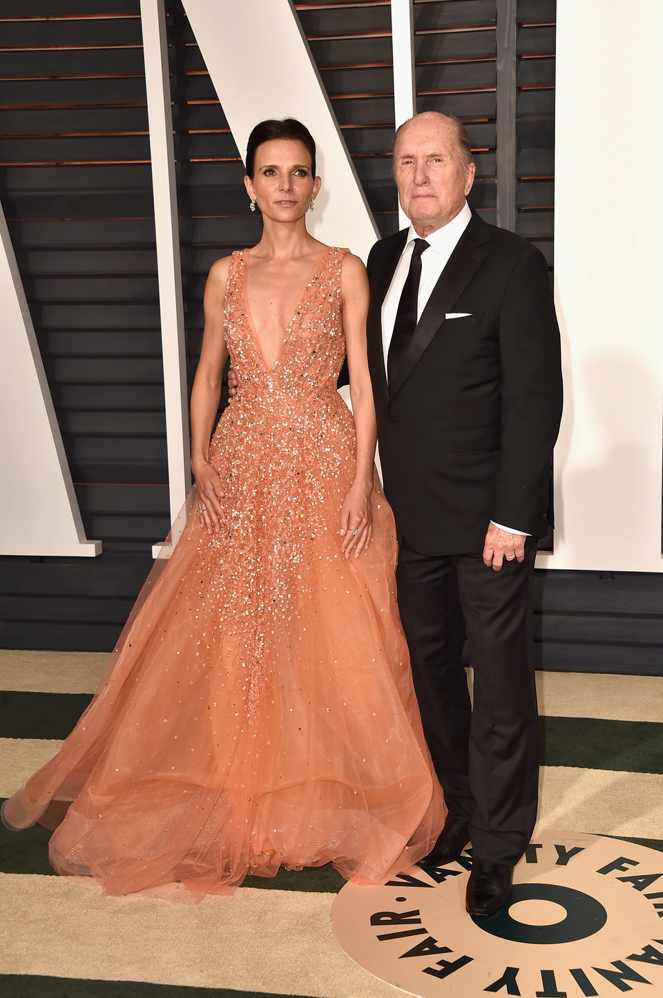 Robert Duvall y su mujer Luciana en la alfombra roja de los Oscar 2015