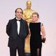 Alexandre Desplat y Dominique Lemonnier en la alfombra roja de los Oscar 2015