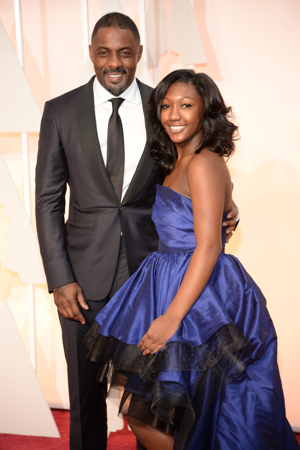 Idris Elba y su hija en la alfombra roja de los Oscar 2015