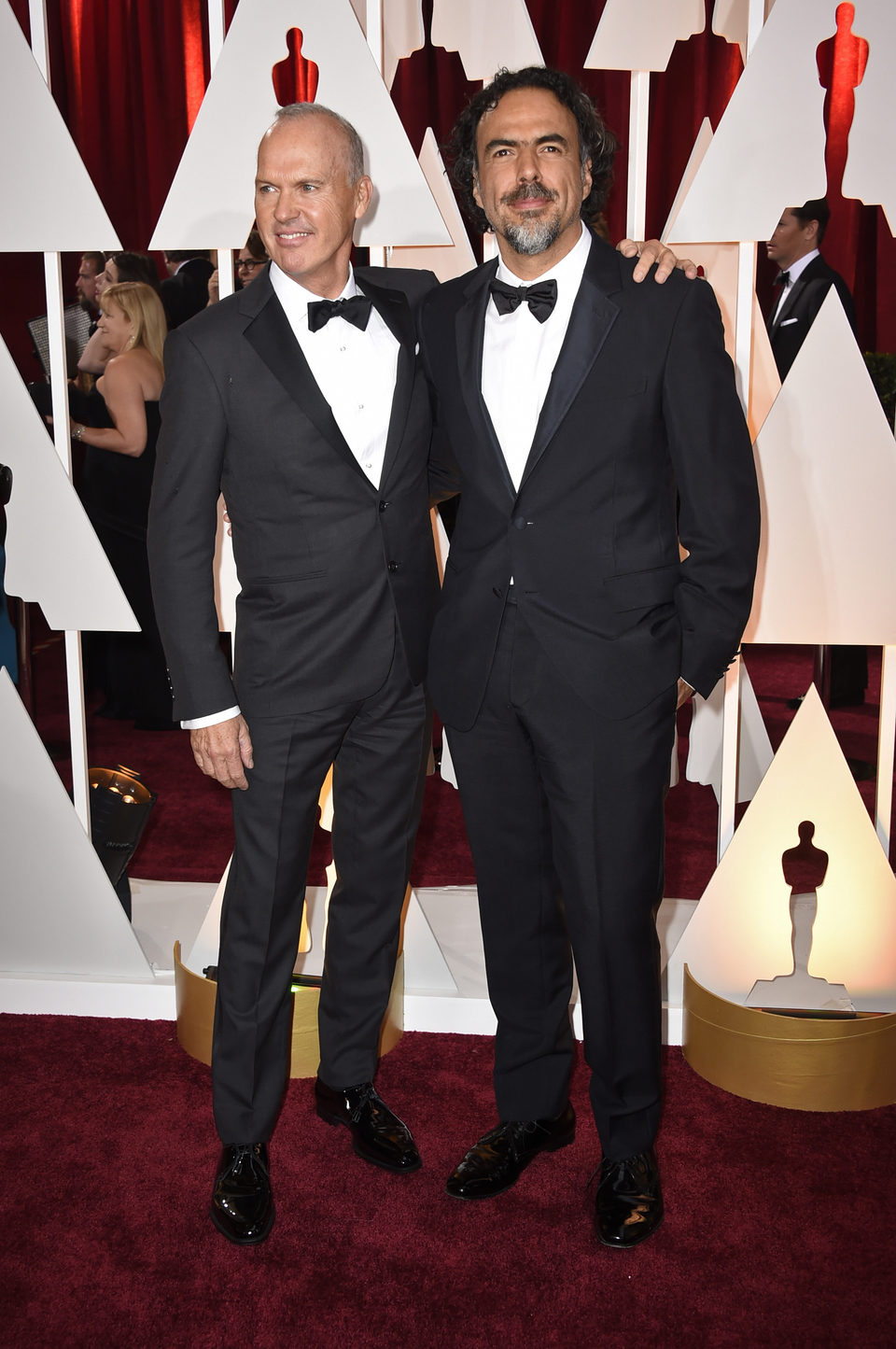 Michael Keaton y Alejandro González Iñárritu en la alfombra roja de los Oscar 2015