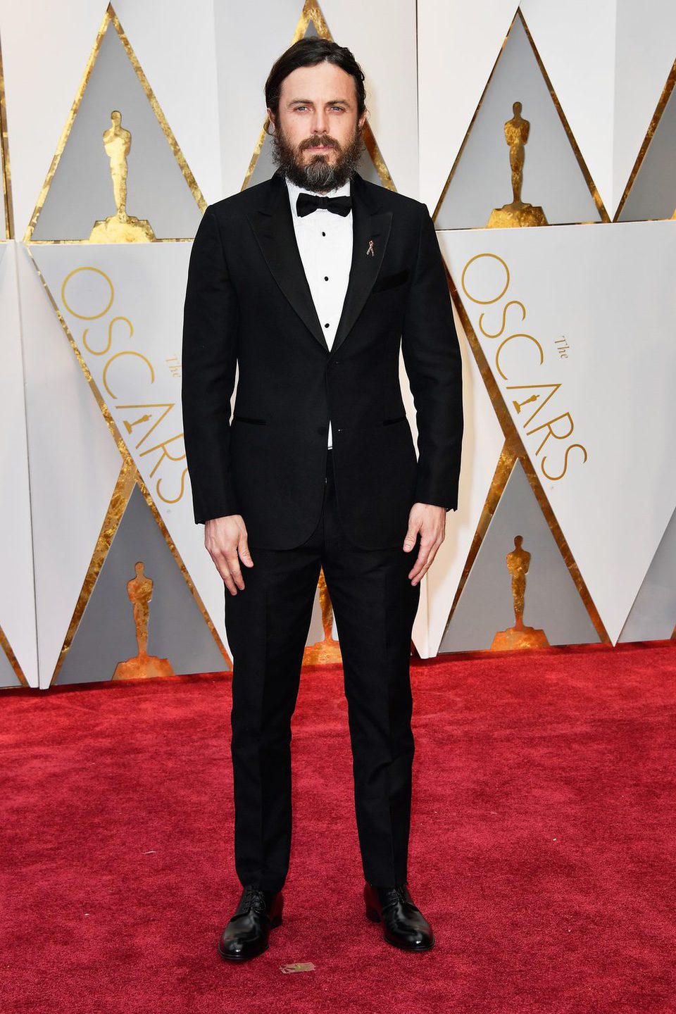 Casey Affleck en la alfombra roja de los Premios Oscar 2017