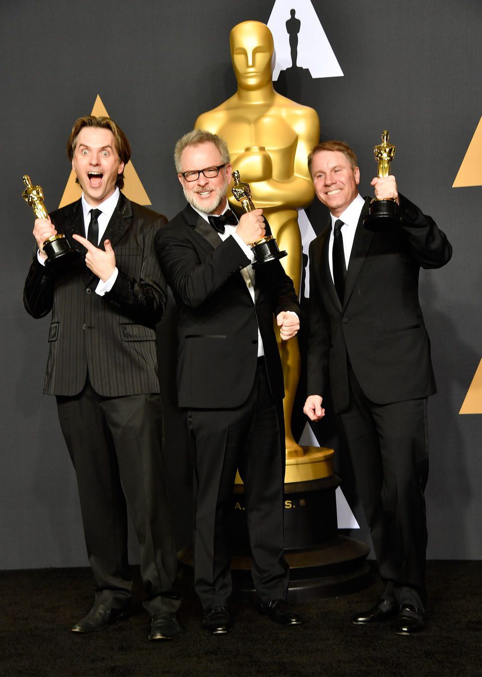 Byron Howard, Rich Moore y Clark Spencer, ganador del Oscar a Mejor Película Animada por 'Zootrópolis'