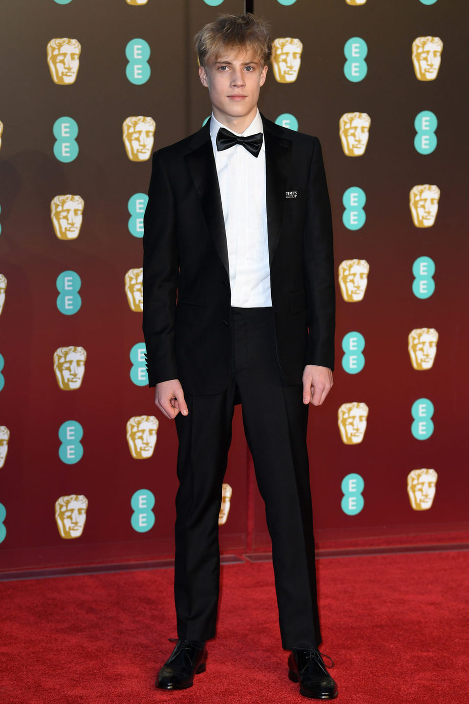 Tom Taylor en la alfombra roja de los BAFTA 2018