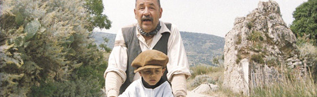 Philippe Noiret y Salvatore Cascio en Cinema Paradiso