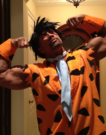 Dwayne Johnson como Pedro Picapiedra