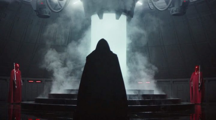  Un personaje oscuro con capa está custodiado por Soldados Imperiales en 'Rogue One: Una historia de Star Wars'