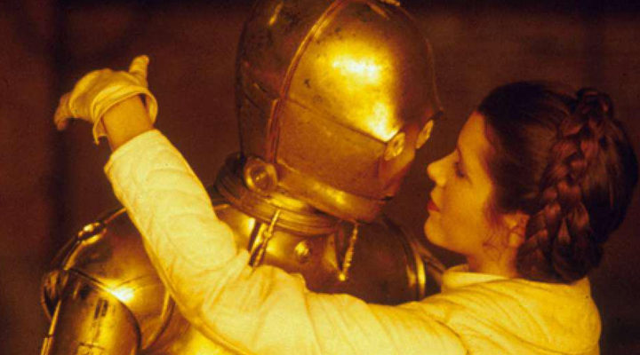 Carrie Fisher besando a C-3PO