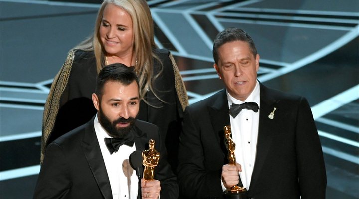 'Adrian Molina, Lee Unkrich y Darla K. Anderson recogiendo el Oscar a Mejor Película de Animación'