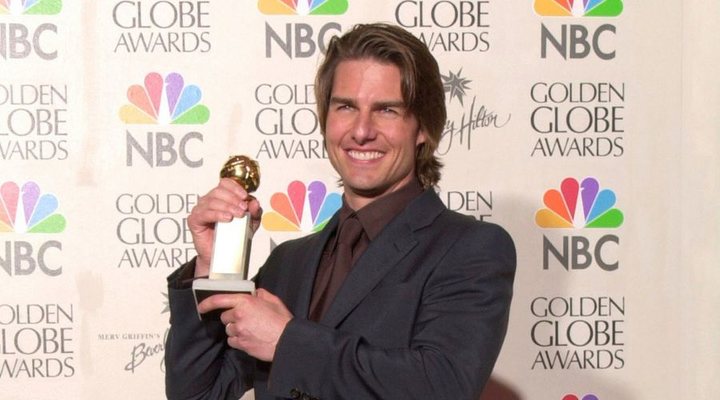 Tom Cruise con uno de sus Globos de Oro